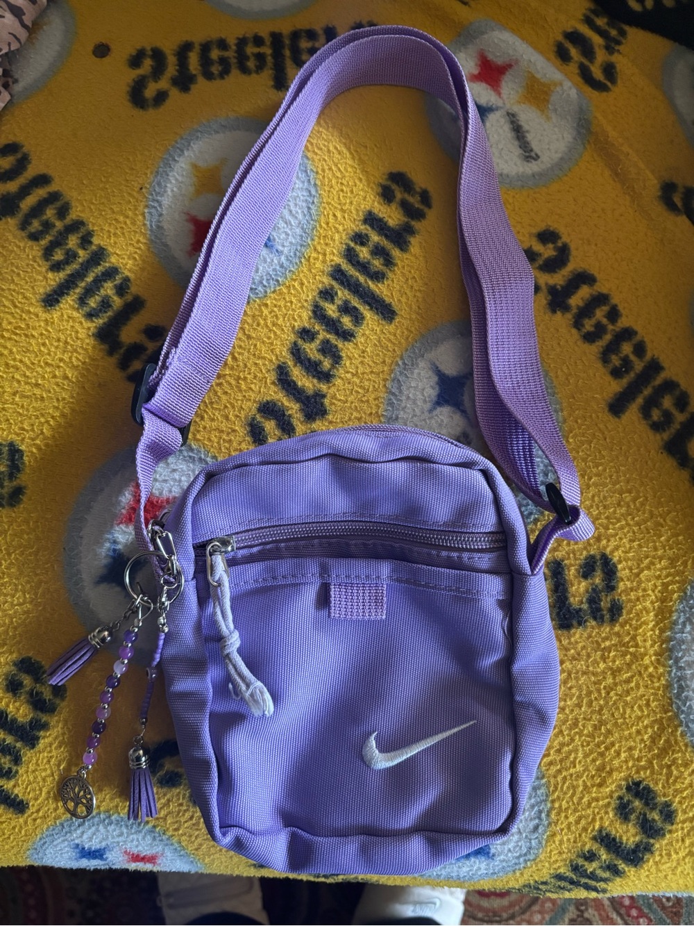 Nike Purple Lavender Crossbody Bag with adjustable Strap w unique keychain tassl
